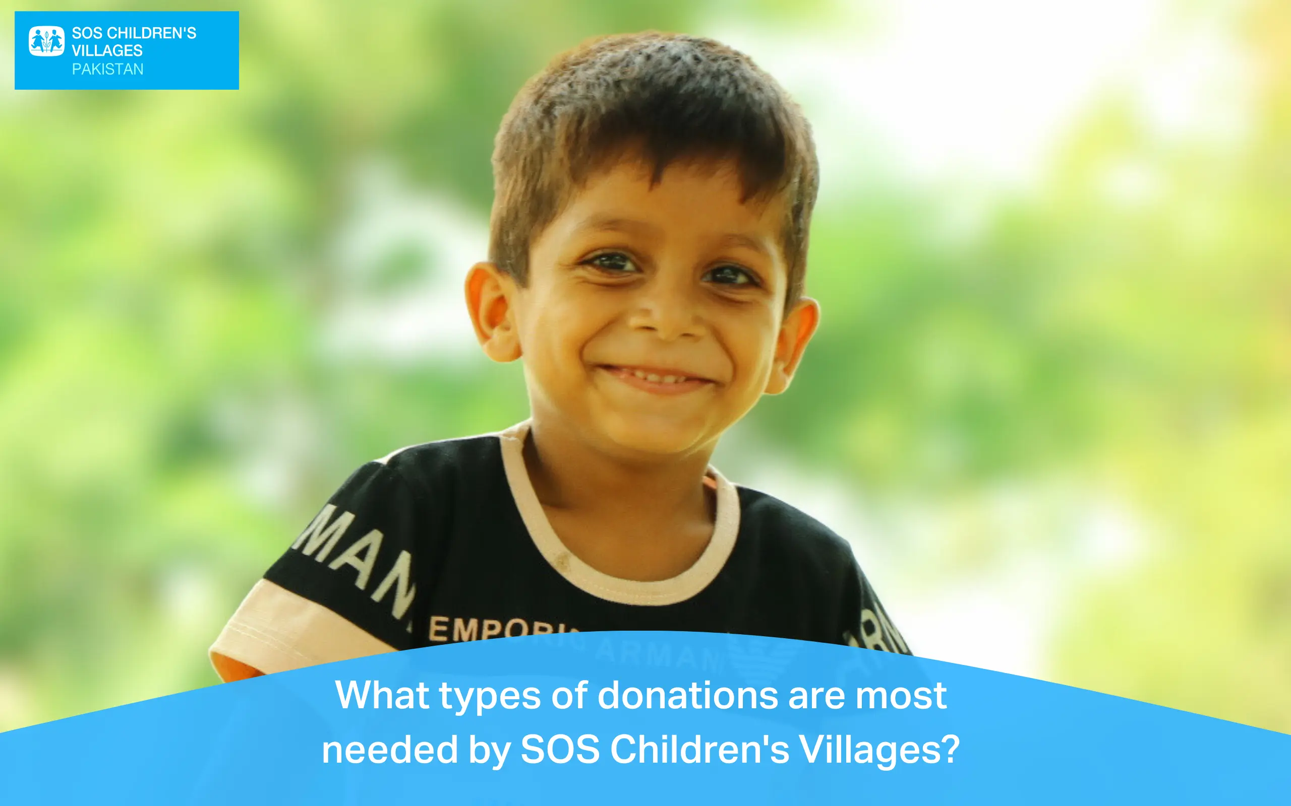 Close-up of a smiling young boy wearing a dark t-shirt, with a blurred green background.Students learning computer skills at SOS Technical Institute in Pakistan with text asking about success stories supported through donations.